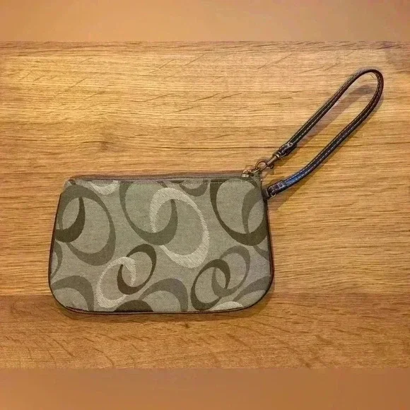 Wristlet clutch purse with interior card slots and exterior zip compartment. - Picture 3 of 5